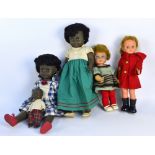 Two 1960/70s black 'Friedo' dolls, both with black wigs, open/close yellow/brown glass eyes,