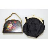 An early 20th century black silk evening purse with ivory mounts,