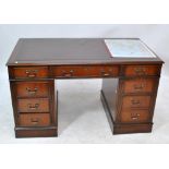 A reproduction mahogany twin pedestal desk, width 135cm.