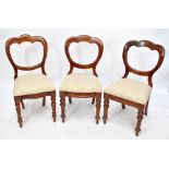 A 19th century harlequin set of eight mahogany crown back dining chairs with upholstered drop-in