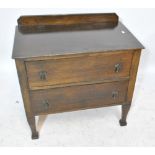 An early 20th century oak two long drawer chest, width 77.5cm.