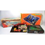 A collection of toys and games to include micro Scalextric 'Mighty Minis' (one missing),