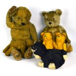 Four early to mid-20th century golden/blonde teddy bears,