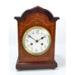 JUNGHANS; an Edwardian inlaid mahogany cased mantel clock,