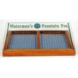 A mid-20th century oak Waterman's Ideal Fountain Pen counter top display,