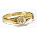 An 18ct yellow gold diamond solitaire ring, the round brilliant cut stone approx 0.