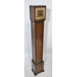 An early 20th century oak cased longcase clock of small proportions,