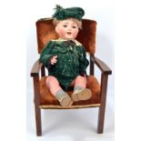 An early 20th century Kammer & Reinhardt doll with bisque head manufactured by Simon & Halbig,