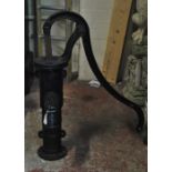 A black painted cast iron water pump, height 76cm.