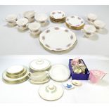 A Royal Doulton six setting dinner service comprising dinner plates, side plates, salad plates,