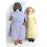 An Armand Marseille bisque headed black baby doll with articulated composite body, no.