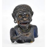 A cast iron Dinah figural money box, height 17cm.