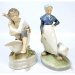 ROYAL COPENHAGEN; two figures comprising goose boy and goose girl, each with printed marks to base,