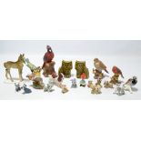 A group of six ceramic figures of birds, a further Beswick matt glazed dog,