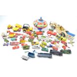 A collection of play worn model cars and vehicles to include Mini-Tonka Scraper and further diecast