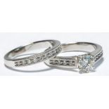 A 14ct white gold and diamond half hoop eternity ring,