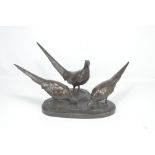 PROFESSOR OTTO POERTZEL (1876-1963); a bronze figure group of three pheasants,