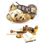 A collection of 20th century predominantly African items to include wooden masks,