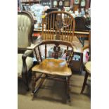 A 19th century yew wood Windsor rocking chair.