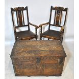 A pair of oak elbow chairs with barleytwist stretchered supports, and an oak coffer (3).