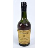 A bottle of Croizet Grande Réserve Vintage 1914 cognac, liquid level at base of shoulders.