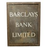 A vintage Barclay's Bank Ltd bronze sign in a frame with fixing holes, 62 x 46cm.