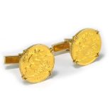 A pair of 9ct yellow gold cufflinks set with two Edward VII half sovereigns, 1902 and 1909,