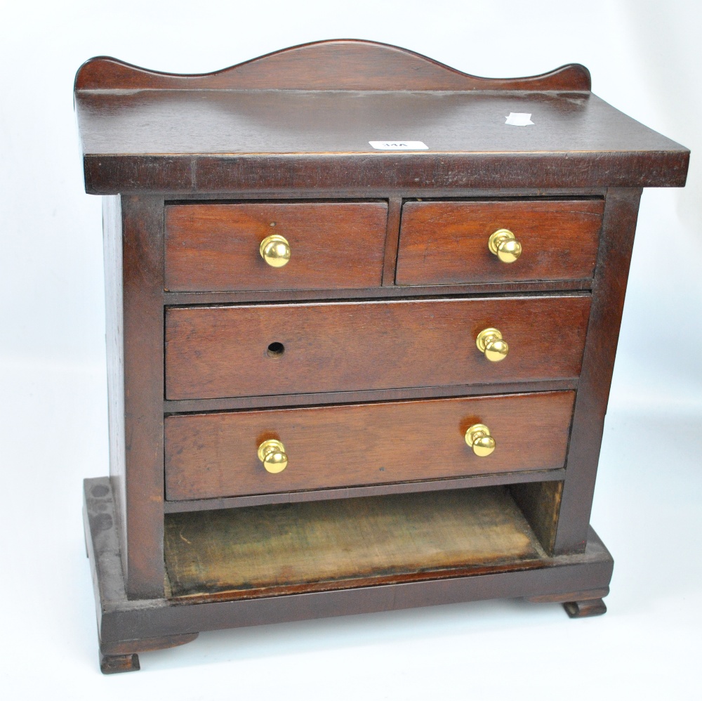 A mahogany miniature chest of two short and two long drawers, width 45cm.