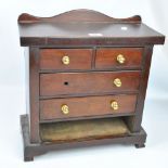 A mahogany miniature chest of two short and two long drawers, width 45cm.