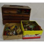 A quantity of vintage Meccano including a five drawer cabinet and associated loose pieces.