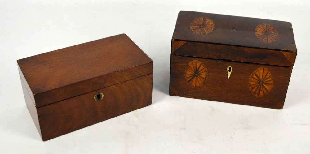 A George III mahogany and satinwood inlaid twin section tea caddy,