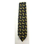 LAURENT; a linen tie decorated with leopards on black ground.