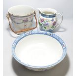 A Losol Ware 'Springfield' pattern toilet jug and bowl, and an 'Athole' pattern bucket (3).