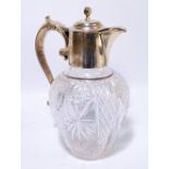 BARKER BROS; a Victorian hallmarked silver mounted cut glass squat baluster shaped claret jug,