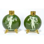 An opposing pair of 19th century Mintons moon flasks after design by Dr Christopher Dresser,