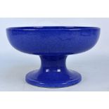 MOORCROFT; a powder blue glazed pedestal bowl, with impressed mark to base, diameter 29cm.
