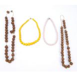 A carved wooden round bead necklace,