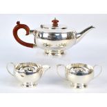 G BRYAN & CO; a George VI hallmarked silver three piece tea service,