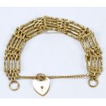 A 9ct yellow gold gate link bracelet, with padlock clasp, approx 21.6g.