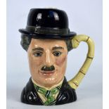 A boxed limited edition Royal Doulton Charlie Chaplin character jug; D6949 787/5000, height 19cm.