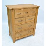 A contemporary oak chest of two medium and two long drawers, width 84.5cm.