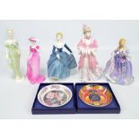 A group of three Royal Doulton figures comprising HN2334 'Fragrance',