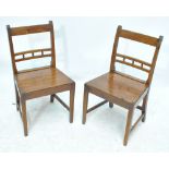 A set of six early 20th century oak chairs on square supports (6).