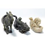 Three Chinese soapstone animals; an archaic style carved tiger box, width 20cm,