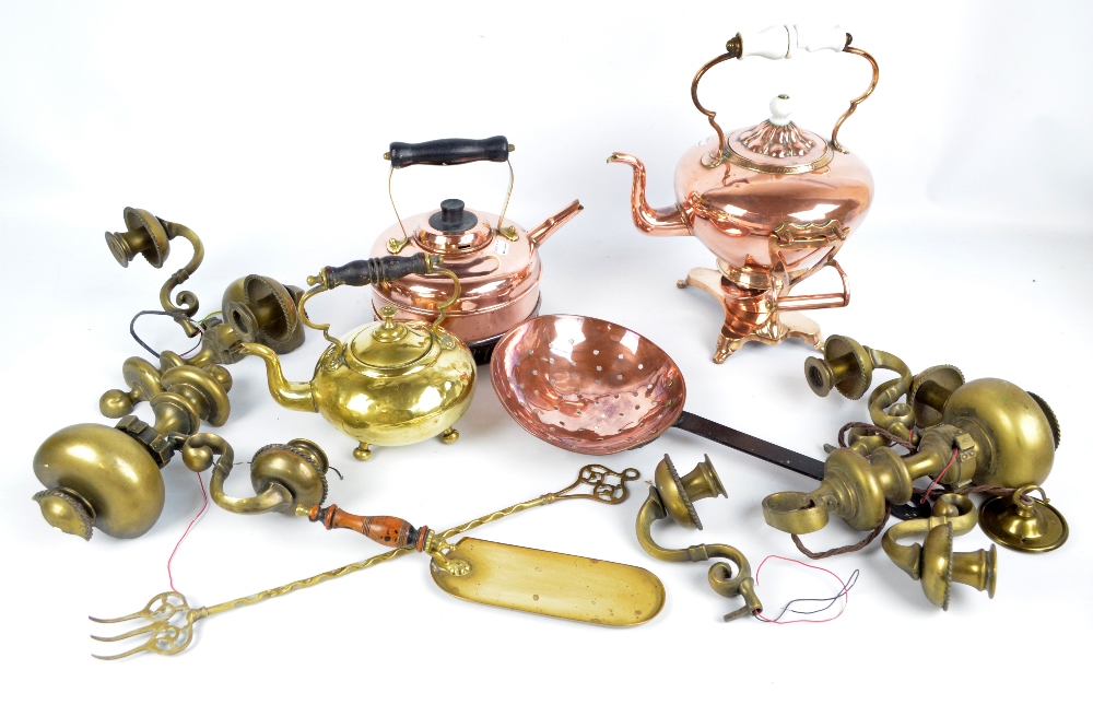 A collection of brass and copper items including a spirit kettle with ceramic handle and finial