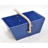 A blue painted trunk with rope handle, length 42cm.