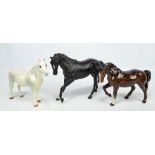 Three ceramic model horses to include two Beswick examples,