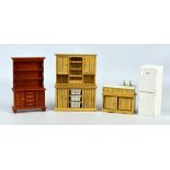 Four items of doll's house furniture comprising two dressers, height of taller 17.