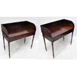 A pair of early 19th century mahogany washstands raised on turned tapered legs to cylindrical feet,