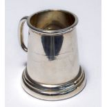 An early to mid-20th century possibly Indian colonial silver miniature mug of Georgian form,